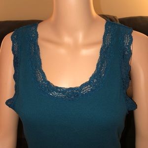 INC turquoise tank top. Sleeves & neck line R lace
